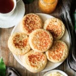 plate of crumpets with tea and marmalade