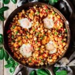 skillet of breakfast hash with eggs