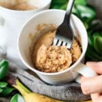 person eating a banana mug cake
