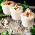 three glasses of maple mousse with spoons