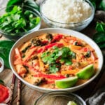 bowl of Thai red curry with rice and cilantro