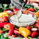 person holding a spoonful of buttermilk ranch
