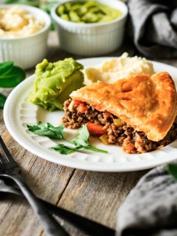 slice of minced beef pie on a white plate