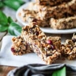 stack of citrus granola bars on parchment paper