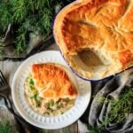 slice of ham and cabbage pie with two forks