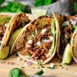 browned tortilla filled with Chipotle pork carnitas, red onion, and avocado.