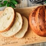 sliced cob loaf on a cutting board.