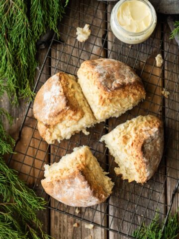 Irish boxty bread on a wire cooling rack with butter.