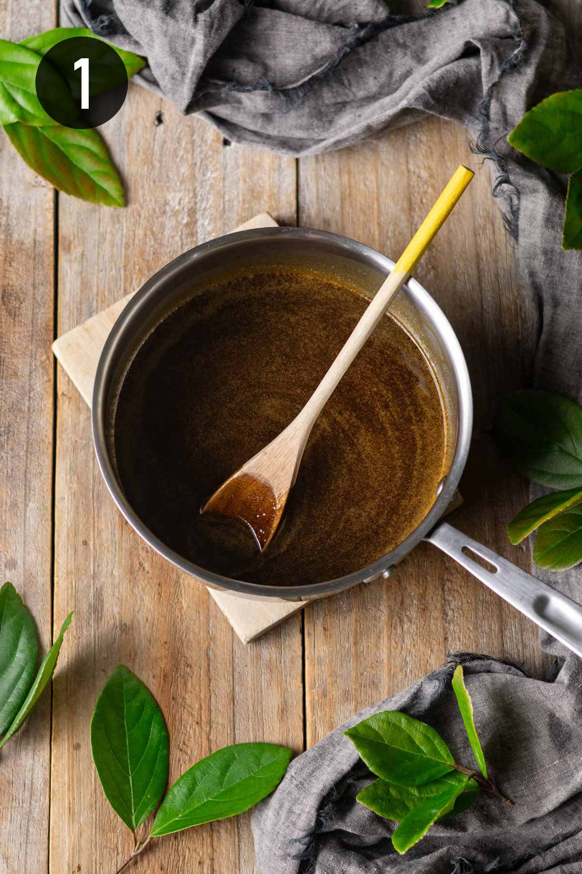 melted butter, molasses, and golden syrup mixture in a pot.