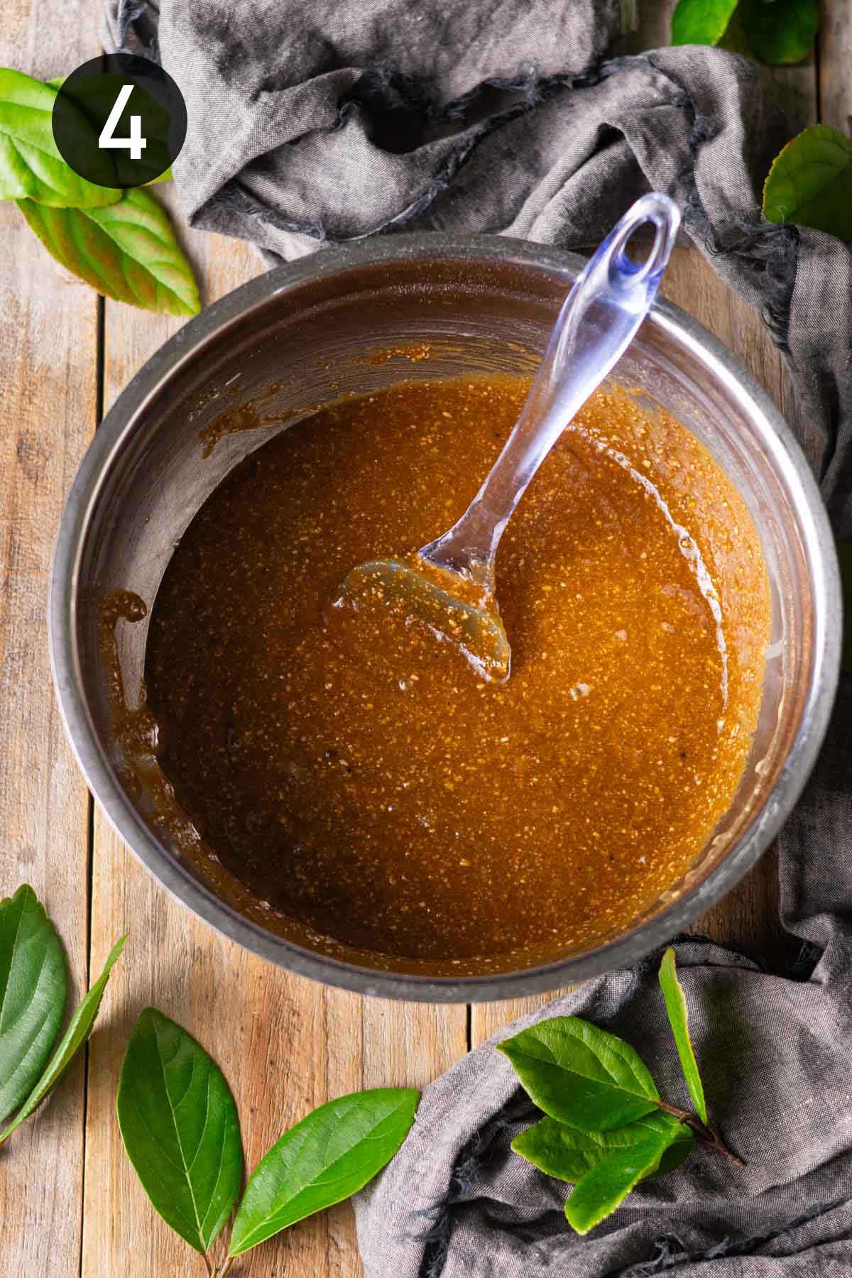 parkin batter in a large metal mixing bowl.