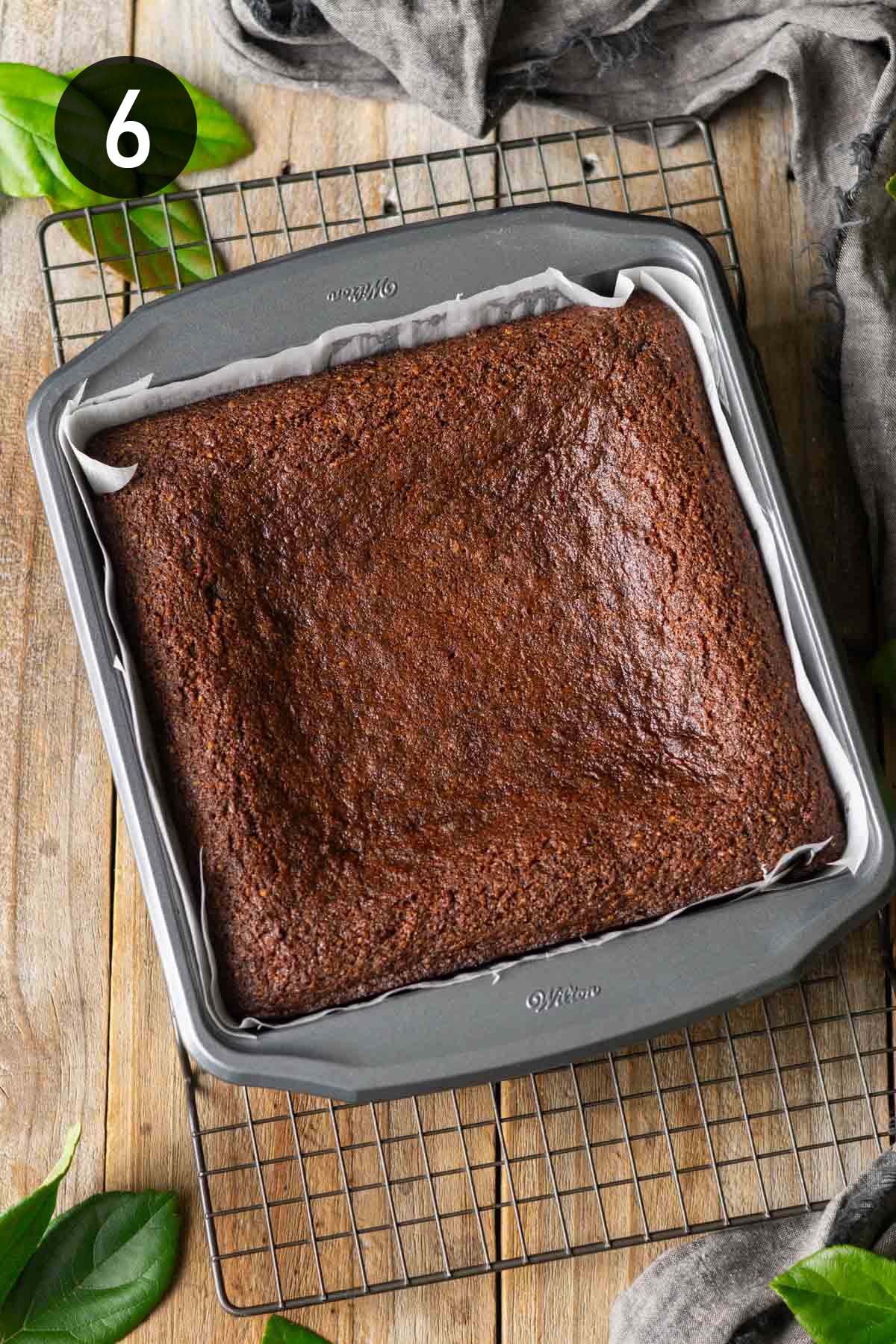 baked parkin in a square metal tin.