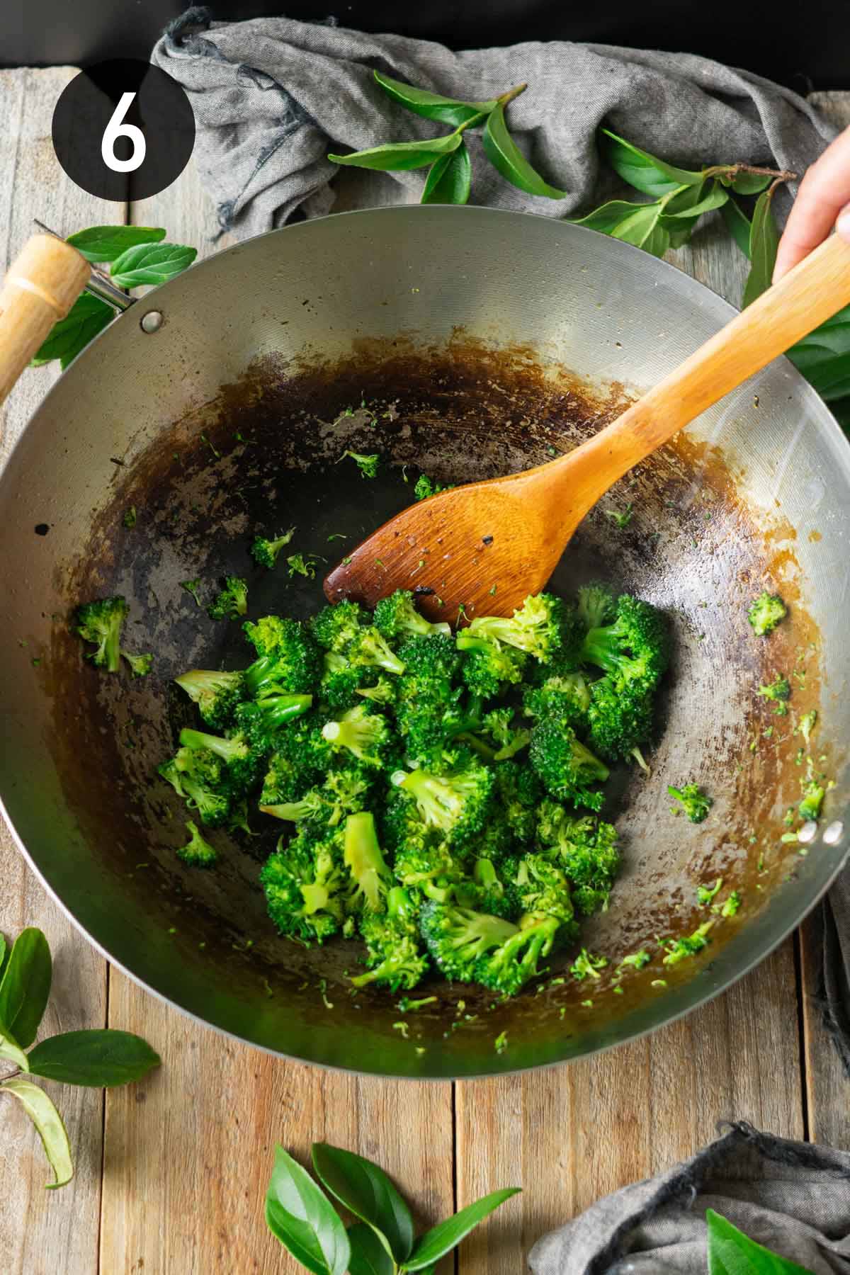 browning the broccoli in the wok.