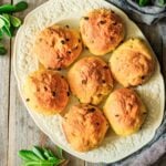 yellow platter of seven baked Cornish saffron buns.