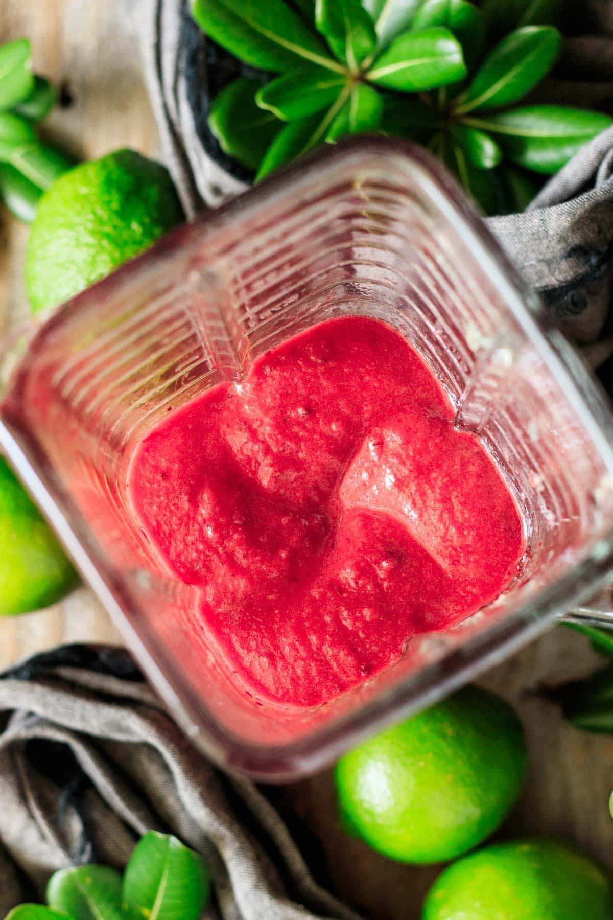 blended frozen cherries and limeade in a blender.